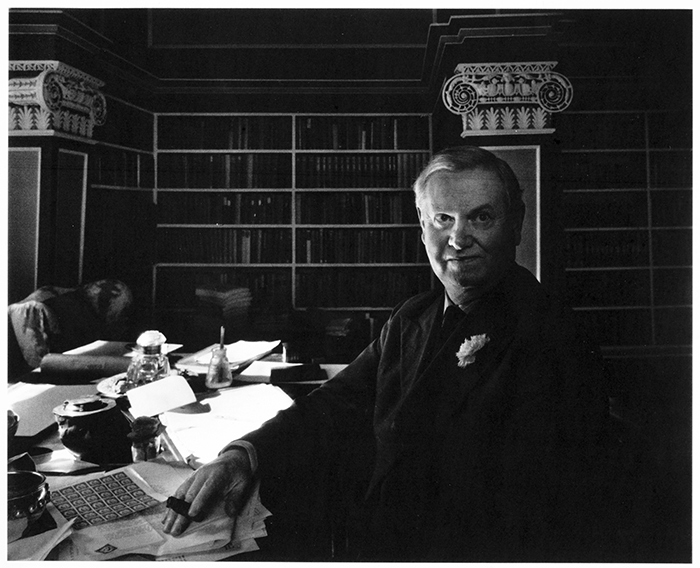 Evelyn Waugh, pictured here around 1950, loved books as literature and beautiful objects. Photographic print from the Evelyn Waugh Papers. The Huntington Library, Art Collections, and Botanical Gardens.