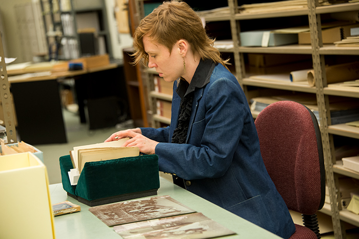 Kiki Loveday researches representations of the ancient Greek love poet Sappho in the Library. Photo by Kate Lain.