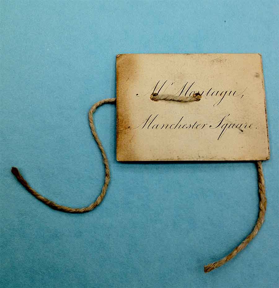 Filing tag made from printed visiting card of Mr Montagu Manchester Square