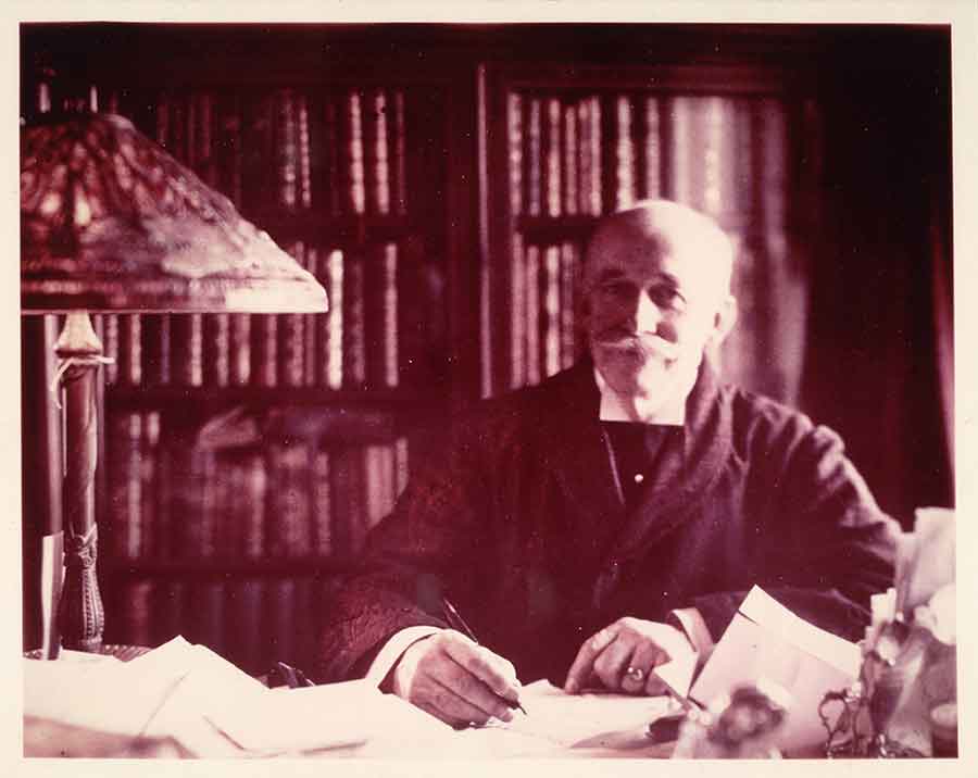 Henry E. Huntington (1850–1927), sitting at his desk. The Huntington Library, Art Collections, and Botanical Gardens.