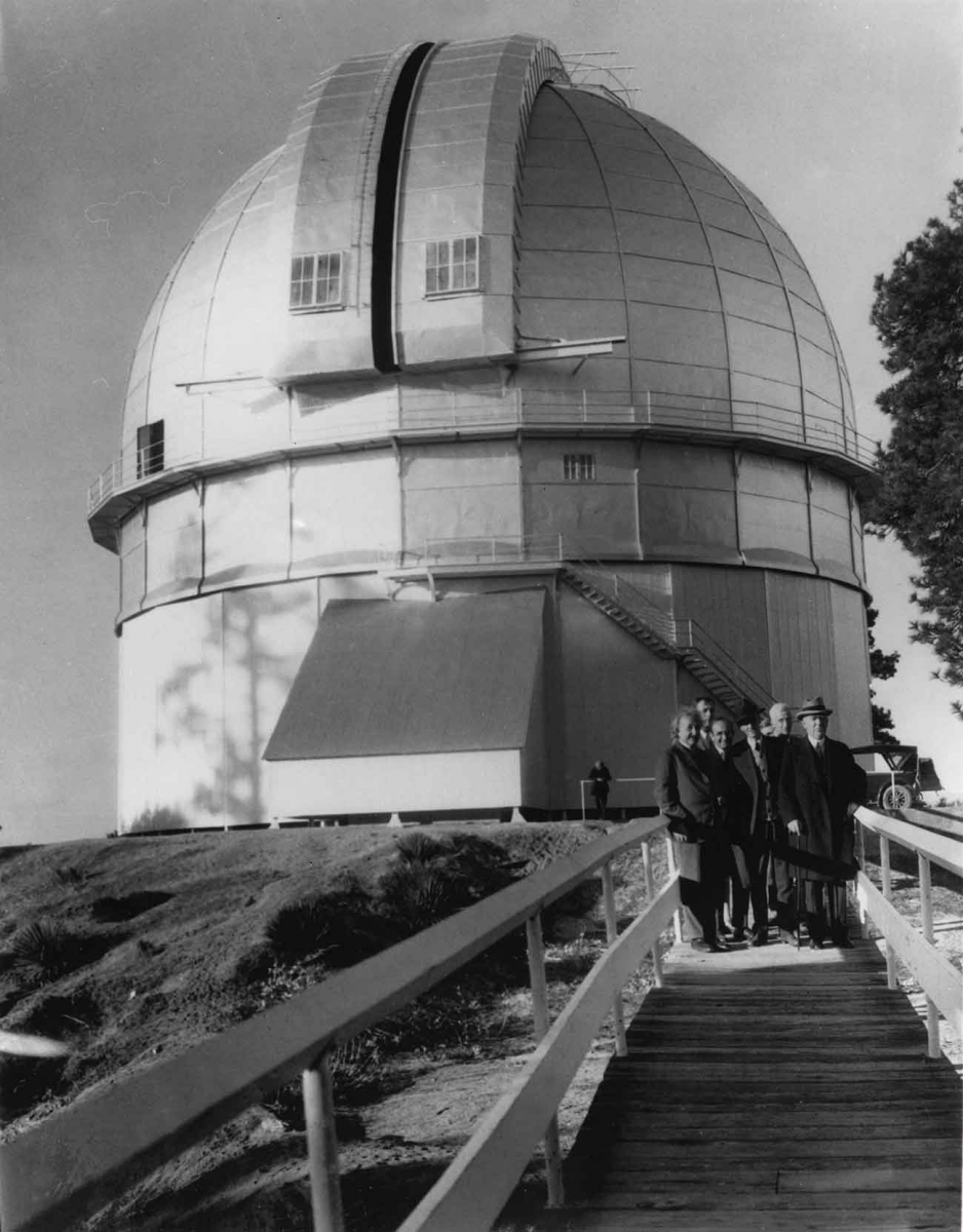 Scientists Albert Einstein, Edwin Hubble, Walther Mayer, Walter S. Adams, Arthur S. King, and William W. Campbell in front of the 100-inch telescope dome at Mount Wilson Observatory on Jan. 29, 1931. The Observatories of the Carnegie Institution for Science Collection at the Huntington Library, San Marino, Calif.