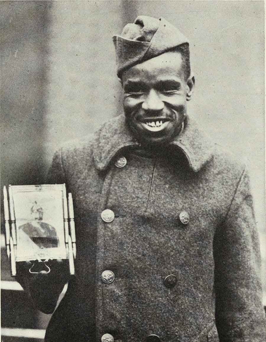 “Corporal Fred. McIntyre of the 369th Infantry with Picture of the Kaiser Which He Captured from a German Officer,” in William Allison Sweeney, History of the American Negro in the Great World War, 1919, Cuneo-Henneberry, Chicago. The Huntington Library, Art Museum, and Botanical Garden.