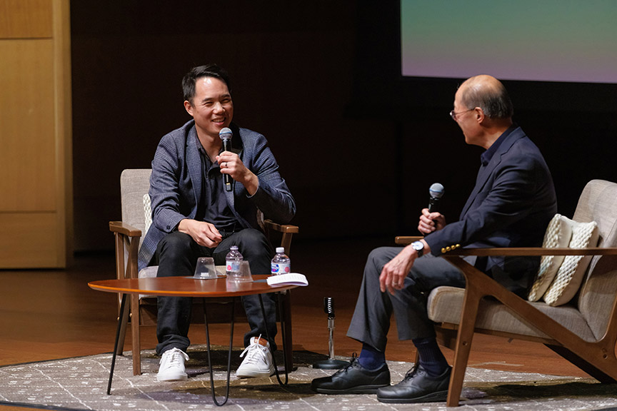 Yu and Li share a laugh at the Founders’ Day event at Rothenberg Hall on March 2. Photo by Sarah M. Golonka.